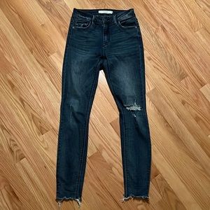 Hidden raw cut skinny jeans
